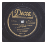 Santa Claus is Comin' to Town / Jingle Bells.  Woody Herman on Decca.  $3.00 plus S/H